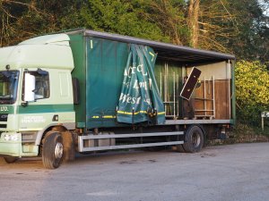 The telehandler unloads a lorry
