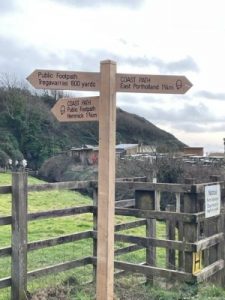 new wooden footpath sign