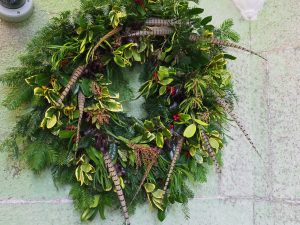 pheasant tail and holly wreath
