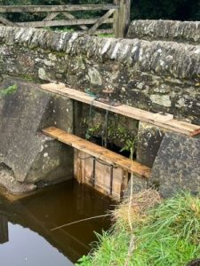 new wooden sluice gate