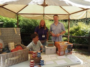 Chris Chalk and the Merlin Trust with the raffle prizes.